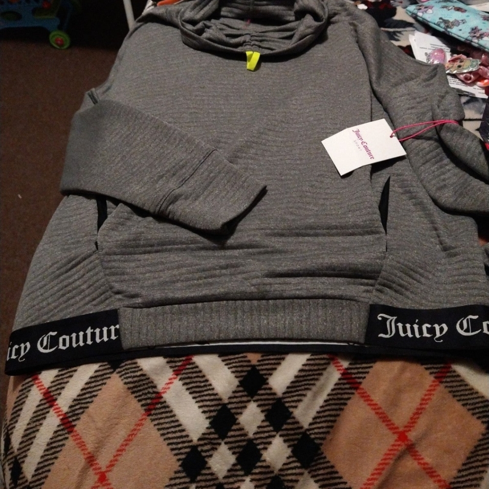 Juicy Couture sports sweater.